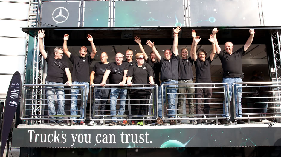 The Truck Trophy crew of professionals celebrating their reunion at the RoadStars Showtruck. 