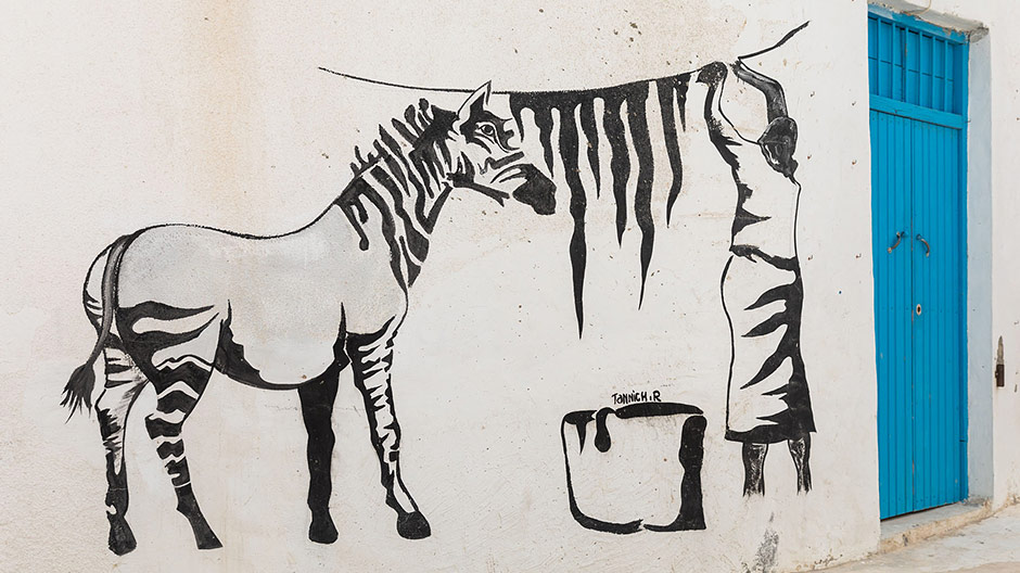 Synagoge, Street-Art, Strassenleben: Wer genau hinschaut, kann auf Djerba viel entdecken.