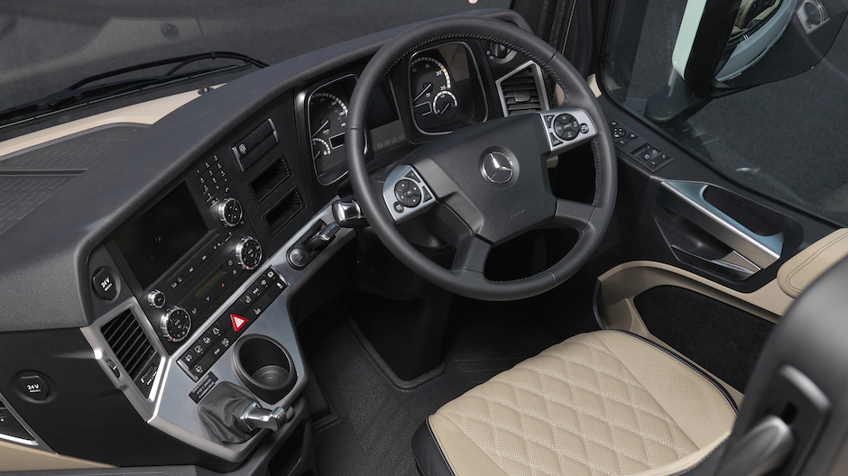 Ergonomic dashboard and multi-function steering wheel
